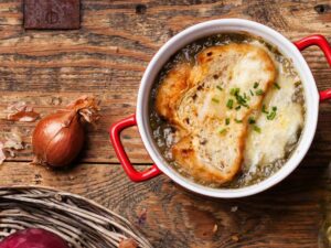 french onion soup in a pan with bread